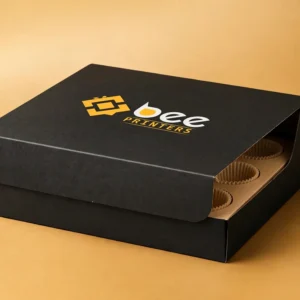 Custom cupcake boxes in white with a fitted insert and the Bee Printers logo printed on the closed lid