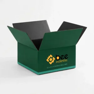 Open dark green cardboard box with a teal base stripe and black inner flaps on a white background, showing 12x9x9 double wall cardboard boxes.