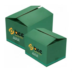 Two green cardboard boxes with partially open top flaps, the larger behind a smaller box in front, both printed with the Bee Printers logo on a white background, showing custom 18x18x18 double wall cardboard boxes.