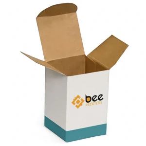 An open empty tall white box with a teal band along the base and its brown kraft flaps spread open on a white background, with the Bee Printers logo in the centre of the front face, showing custom 6 x 4 x 4 single wall cardboard boxes.