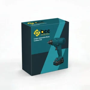 Closed teal and dark teal box with a cordless drill printed on the front on a plain white background, showing custom automotive boxes with the Bee Printers logo.