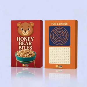 A red Honey Bear Bites cereal box front with a bear face and cereal bowl beside its orange back panel with a Fun and Games maze and word search on a pale reflective background, with the Bee Printers logo on both boxes, showing custom back of cereal box