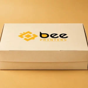 Custom bakery box in warm cream with the Bee Printers logo printed on the closed lid, rectangular assorted bakery style