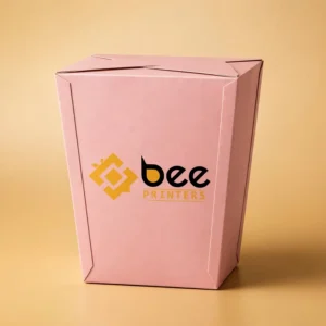 Custom barbie popcorn boxes in pink movie style with the Bee Printers logo printed on the front panel