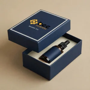 Navy blue two-piece rigid box with its lid lifted to reveal a brown dropper bottle resting in a cream insert on a beige background, with the Bee Printers logo and Beard Oil text on the lid, showing custom beard oil two piece boxes