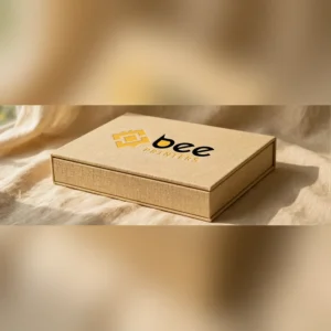 Custom booklet rigid box with a hinged cover and printed Bee Printers logo on the lid
