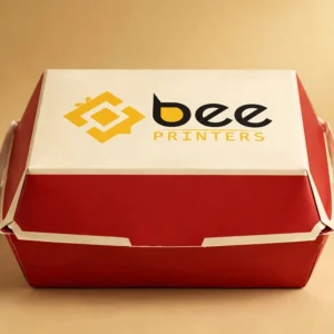 Custom clamshell burger box in bold red and cream with the Bee Printers logo printed on the closed top