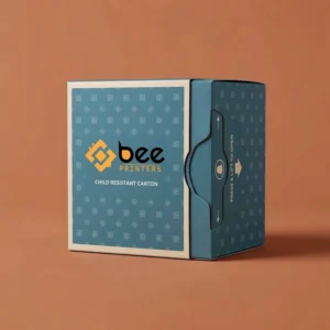 A closed teal patterned folding carton with a press and lift to open side tab and the Bee Printers logo on a terracotta background, showing custom child resistant folding cartons.