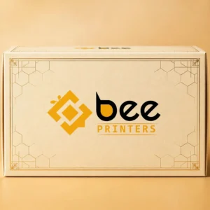 Custom cookie box in warm cream and gold tones with the Bee Printers logo printed on the closed lid