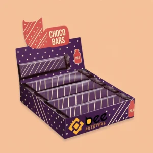 Purple star-patterned custom counter display boxes labelled CHOCO BARS with a cat-ear shaped header holding striped chocolate bars on a peach background with the Bee Printers logo on the front.