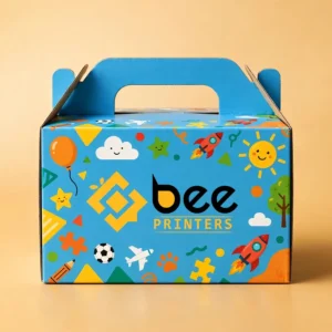 Custom happy meal box with carry handle closed and the Bee Printers logo printed on the front on a warm golden-beige backdrop