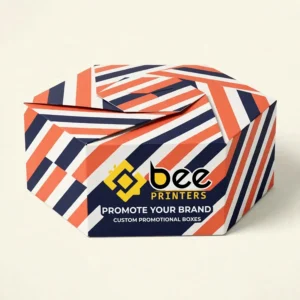 Closed hexagonal box with bold orange, navy and white diagonal stripes and Promote Your Brand text on a cream background, showing custom promotional boxes
