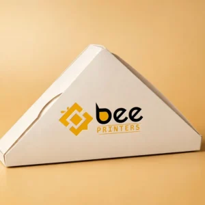 Custom sandwich packaging wedge box in warm white with the Bee Printers logo printed on the closed pack, single hero pack on a warm golden-beige studio backdrop