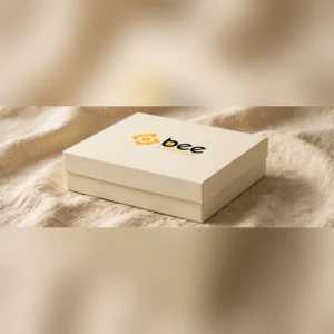 custom two piece rigid boxes — a closed cream two-piece rigid box shown at a three-quarter angle with the Bee Printers logo printed on the lid